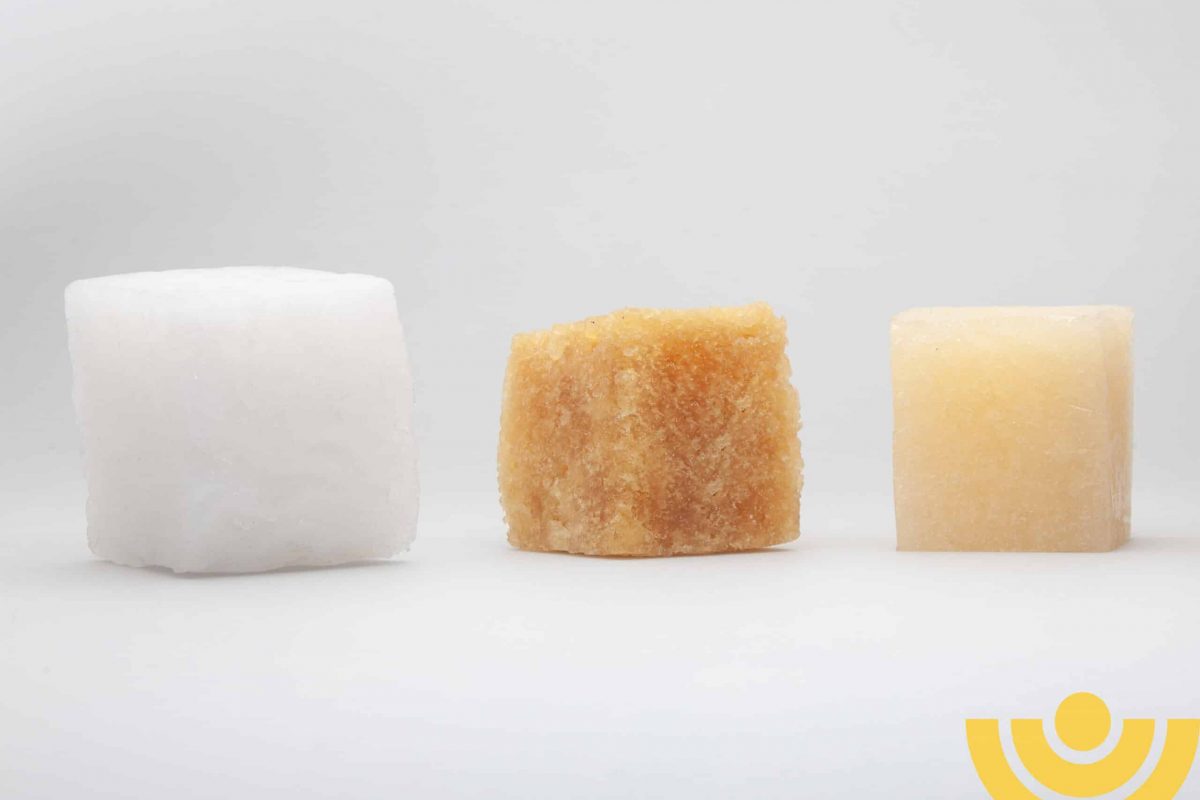 four multi-colored cubes synthetic rubber samples on a black background shot close in the studio